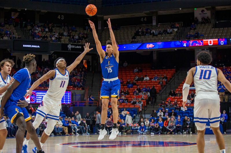 Jan 3, 2023; Boise, Idaho, USA; San Jose State Spartans forward Trey Anderson (15) attempts a three-point shot during the first half against the Boise State Broncos at ExtraMile Arena. Mandatory Credit: Brian Losness-USA TODAY Sports