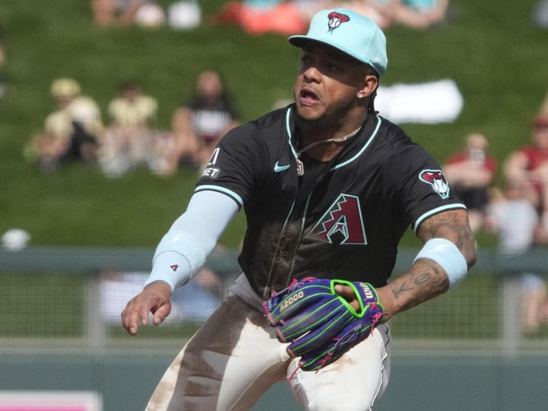 Feb 27, 2024; Salt River Pima-Maricopa, Arizona, USA; Arizona Diamondbacks second baseman Ketel Marte (4) makes the play for an out against the Texas Rangers during the third inning at Salt River Fields at Talking Stick. Mandatory Credit: Rick Scuteri-USA TODAY Sports