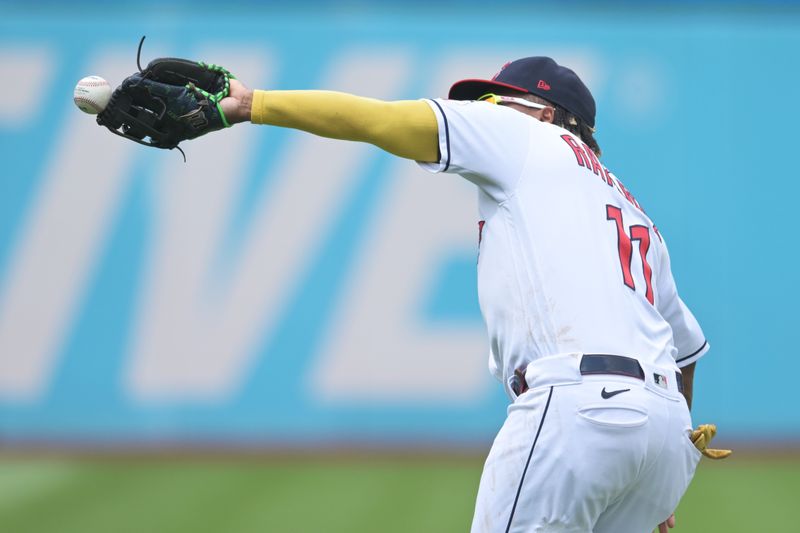 Jul 23, 2023; Cleveland, Ohio, USA; Cleveland Guardians third baseman Jose Ramirez (11) misses the ball hit by Philadelphia Phillies center fielder Brandon Marsh (not pictured) during the sixth inning at Progressive Field. Mandatory Credit: Ken Blaze-USA TODAY Sports