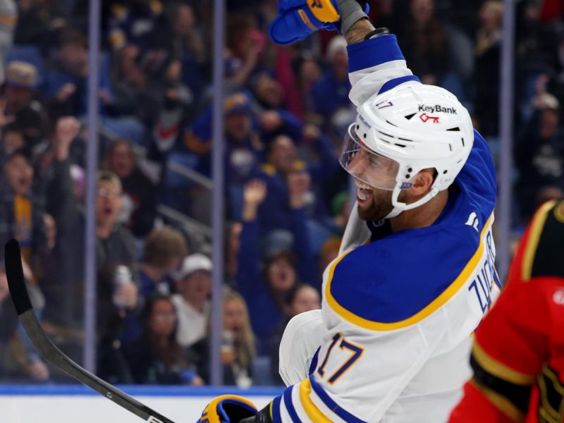 Oct 15, 2025; Buffalo, New York, USA;  Buffalo Sabres left wing Jason Zucker (17) celebrates his second goal of the game during the second period against the Ottawa Senators at KeyBank Center. Mandatory Credit: Timothy T. Ludwig-Imagn Images