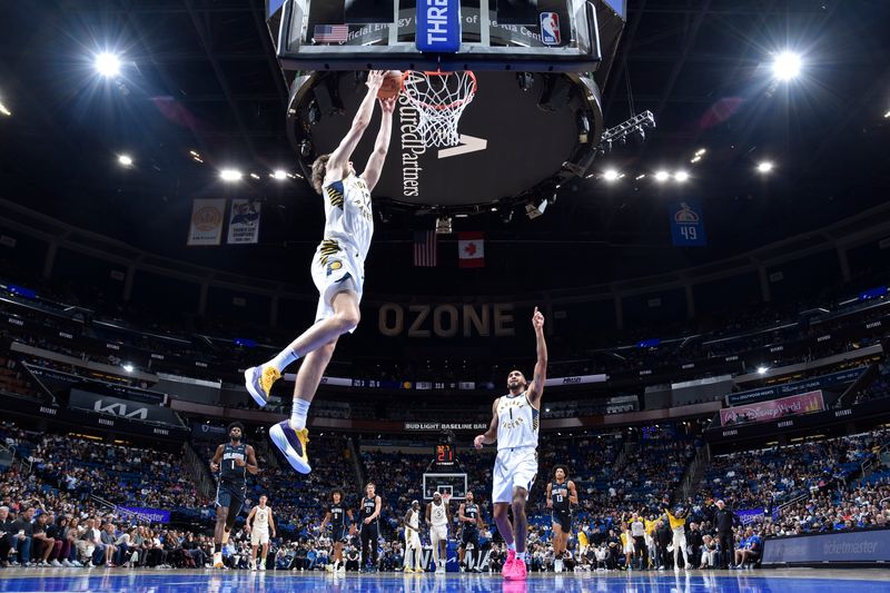 ORLANDO, FL - NOVEMBER 13: Johnny Furphy #12 of the Indiana Pacers dunks the ball during the game against the Orlando Magic on November 13, 2024 at Kia Center in Orlando, Florida. NOTE TO USER: User expressly acknowledges and agrees that, by downloading and or using this photograph, User is consenting to the terms and conditions of the Getty Images License Agreement. Mandatory Copyright Notice: Copyright 2024 NBAE (Photo by Fernando Medina/NBAE via Getty Images)