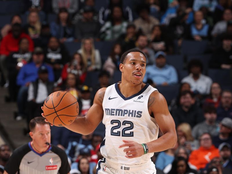 MEMPHIS, TN - NOVEMBER 25: Desmond Bane #22 of the Memphis Grizzlies dribbles the ball during the game against the Portland Trail Blazers on November 25, 2024 at FedExForum in Memphis, Tennessee. NOTE TO USER: User expressly acknowledges and agrees that, by downloading and or using this photograph, User is consenting to the terms and conditions of the Getty Images License Agreement. Mandatory Copyright Notice: Copyright 2024 NBAE (Photo by Joe Murphy/NBAE via Getty Images)