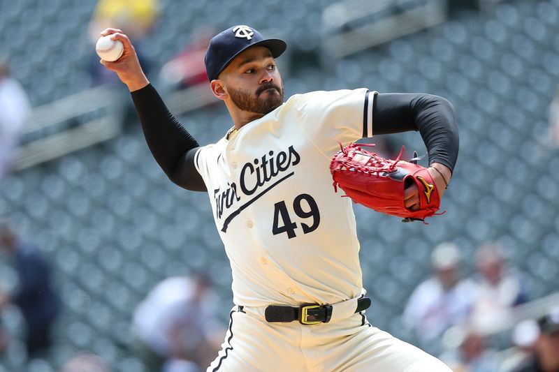 May 9, 2024; Minneapolis, Minnesota, USA; Minnesota Twins starting pitcher Pablo Lopez (49) delivers a pitch against the Seattle Mariners during the first inning at Target Field. Mandatory Credit: Matt Krohn-USA TODAY Sports