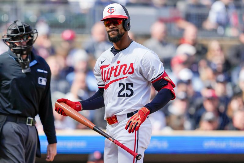 Apr 4, 2024; Minneapolis, Minnesota, USA; Minnesota Twins center fielder Byron Buxton (25) reacts after striking out during the first inning against the Cleveland Guardians at Target Field. Mandatory Credit: Jordan Johnson-USA TODAY Sports