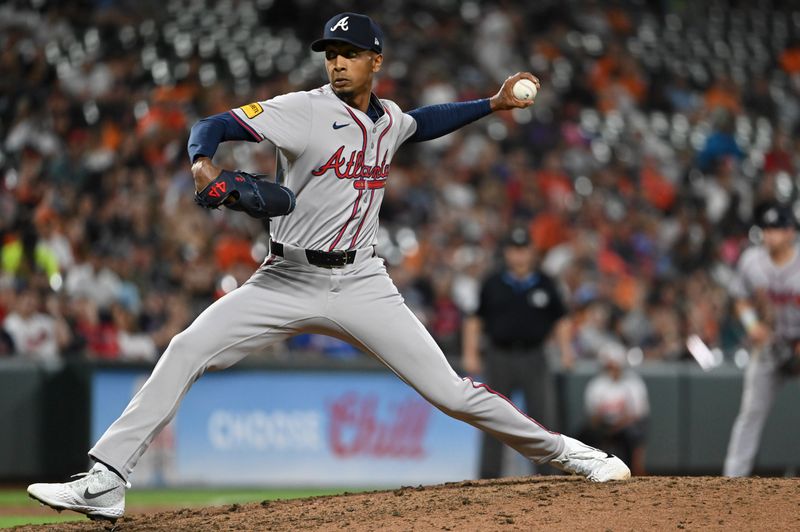 Jun 11, 2024; Baltimore, Maryland, USA; Atlanta Braves pitcher Ray Kerr (58) throws a eighth inning pitch against the Baltimore Orioles  at Oriole Park at Camden Yards. Mandatory Credit: Tommy Gilligan-USA TODAY Sports