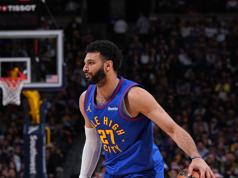 DENVER, CO - APRIL 6: Jamal Murray #27 of the Denver Nuggets dribbles the ball during the game against the Atlanta Hawks on April 6, 2024 at the Ball Arena in Denver, Colorado. NOTE TO USER: User expressly acknowledges and agrees that, by downloading and/or using this Photograph, user is consenting to the terms and conditions of the Getty Images License Agreement. Mandatory Copyright Notice: Copyright 2024 NBAE (Photo by Garrett Ellwood/NBAE via Getty Images)