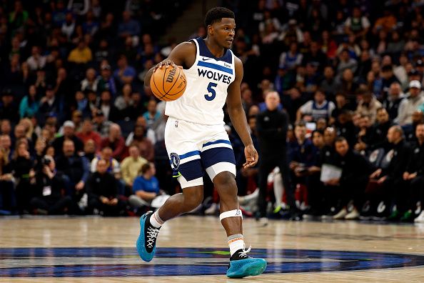 MINNEAPOLIS, MINNESOTA - NOVEMBER 01: Anthony Edwards #5 of the Minnesota Timberwolves dribbles the ball against the Denver Nuggets in the first quarter at Target Center on November 01, 2023 in Minneapolis, Minnesota. The Timberwolves defeated the Nuggets 110-89. NOTE TO USER: User expressly acknowledges and agrees that, by downloading and or using this photograph, User is consenting to the terms and conditions of the Getty Images License Agreement. (Photo by David Berding/Getty Images)