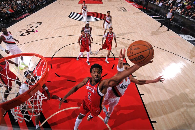 PORTLAND, OR - OCTOBER 27: Herbert Jones #2 of the New Orleans Pelicans rebounds during the game against the Portland Trail Blazers on October 27, 2024 at the Moda Center Arena in Portland, Oregon. NOTE TO USER: User expressly acknowledges and agrees that, by downloading and or using this photograph, user is consenting to the terms and conditions of the Getty Images License Agreement. Mandatory Copyright Notice: Copyright 2024 NBAE (Photo by Cameron Browne/NBAE via Getty Images)