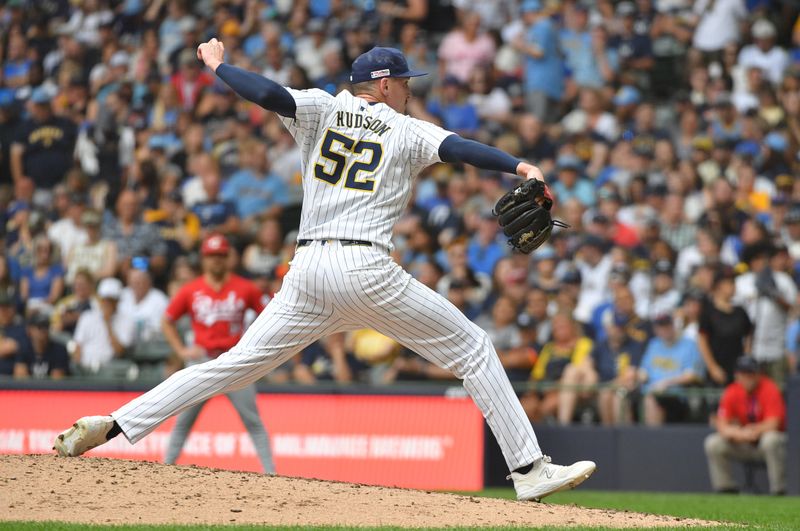 Jun 15, 2024; Milwaukee, Wisconsin, USA; jMilwaukee Brewers pitcher Bryan Hudson (52) delivers a pitch against the Cincinnati Reds in the seventh inning at American Family Field. Mandatory Credit: Michael McLoone-USA TODAY Sports