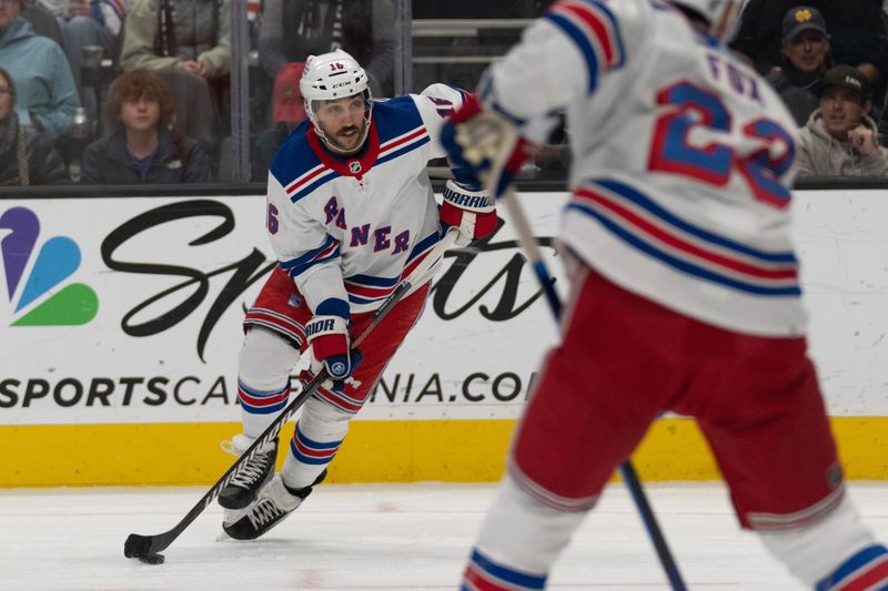 Jan 23, 2024; San Jose, California, USA; New York Rangers center Vincent Trocheck (16) controls the puck during the first period against the San Jose Sharks at SAP Center at San Jose. Mandatory Credit: Stan Szeto-USA TODAY Sports