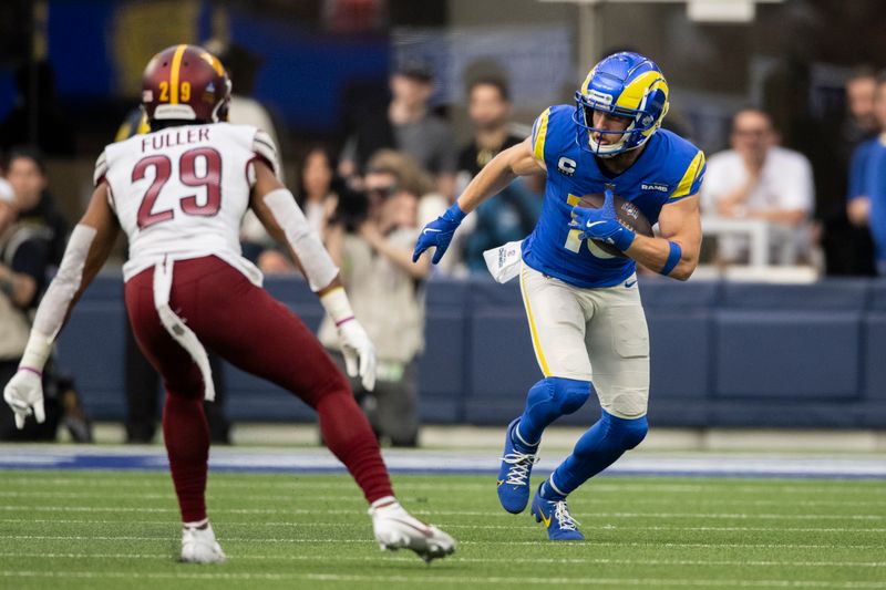 Los Angeles Rams wide receiver Cooper Kupp (10) runs with the ball during an NFL football game against the Washington Commanders, Sunday, Dec. 17, 2023, in Inglewood, Calif. (AP Photo/Kyusung Gong)