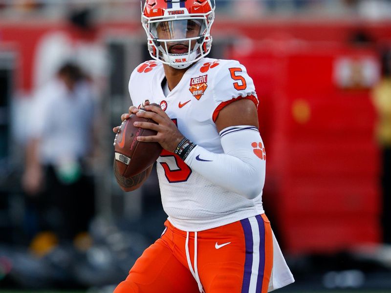 Dec 29, 2021; Orlando, Florida, USA; Clemson Tigers quarterback D.J. Uiagalelei (5) warms up prior to the game against the Iowa State Cyclones at Camping World Stadium. Mandatory Credit: Nathan Ray Seebeck-USA TODAY Sports