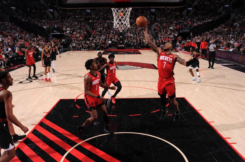 PORTLAND, OR - APRIL 12: Cam Whitmore #7 of the Houston Rockets goes up for the rebound during the game against the Portland Trail Blazers on April 12, 2024 at the Moda Center Arena in Portland, Oregon. NOTE TO USER: User expressly acknowledges and agrees that, by downloading and or using this photograph, user is consenting to the terms and conditions of the Getty Images License Agreement. Mandatory Copyright Notice: Copyright 2024 NBAE (Photo by Cameron Browne/NBAE via Getty Images)