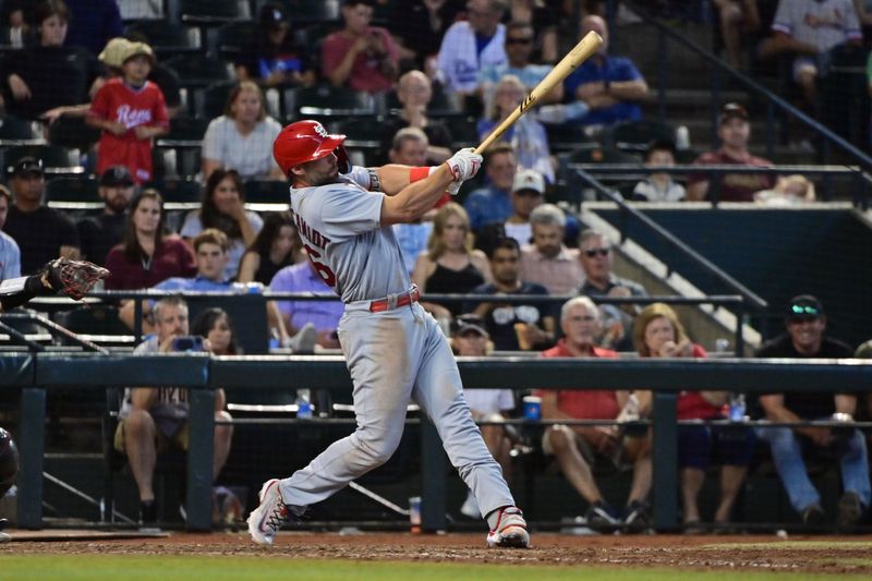 Jul 26, 2023; Phoenix, Arizona, USA;  St. Louis Cardinals first baseman Paul Goldschmidt (46) hits a two run home run in the seventh inning against the Arizona Diamondbacks at Chase Field. Mandatory Credit: Matt Kartozian-USA TODAY Sports