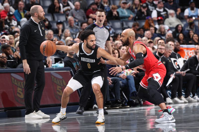 MEMPHIS, TN - FEBRUARY 8: Jacob Gilyard #0 of the Memphis Grizzlies dribbles the ball during the game against the Chicago Bulls on February 8, 2024 at FedExForum in Memphis, Tennessee. NOTE TO USER: User expressly acknowledges and agrees that, by downloading and or using this photograph, User is consenting to the terms and conditions of the Getty Images License Agreement. Mandatory Copyright Notice: Copyright 2024 NBAE (Photo by Joe Murphy/NBAE via Getty Images)