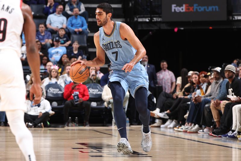 MEMPHIS, TN - MARCH 2: Santi Aldama #7 of the Memphis Grizzlies dribbles the ball during the game against the Portland Trail Blazers on March 2, 2024 at FedExForum in Memphis, Tennessee. NOTE TO USER: User expressly acknowledges and agrees that, by downloading and or using this photograph, User is consenting to the terms and conditions of the Getty Images License Agreement. Mandatory Copyright Notice: Copyright 2024 NBAE (Photo by Joe Murphy/NBAE via Getty Images)