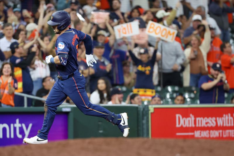 May 13, 2024; Houston, Texas, USA; Houston Astros third baseman Alex Bregman (2) rounds the bases after a home run against the Oakland Athletics in the seventh inning at Minute Maid Park. Mandatory Credit: Thomas Shea-USA TODAY Sports