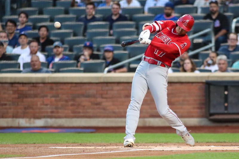 Aug 26, 2023; New York City, New York, USA;  Los Angeles Angels designated hitter Shohei Ohtani (17) hits a double in the first inning against the New York Mets at Citi Field. Mandatory Credit: Wendell Cruz-USA TODAY Sports