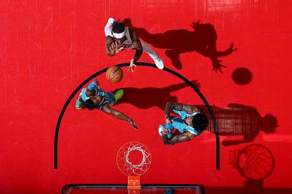 TORONTO, CANADA - DECEMBER 18:  Chris Boucher #25 of the Toronto Raptors drives to the basket during the game against the Charlotte Hornets on December 18, 2023 at the Scotiabank Arena in Toronto, Ontario, Canada.  NOTE TO USER: User expressly acknowledges and agrees that, by downloading and or using this Photograph, user is consenting to the terms and conditions of the Getty Images License Agreement.  Mandatory Copyright Notice: Copyright 2023 NBAE (Photo by Vaughn Ridley/NBAE via Getty Images)