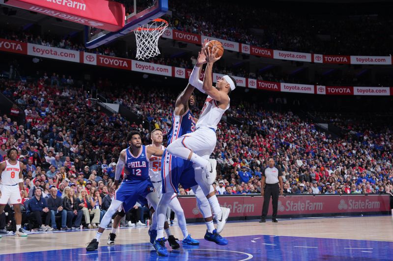 PHILADELPHIA, PA - APRIL 25: Josh Hart #3 of the New York Knicks drives to the basket during the game against the Philadelphia 76ers during Round 1 Game 3 of the 2024 NBA Playoffs on April 25, 2024 at the Wells Fargo Center in Philadelphia, Pennsylvania NOTE TO USER: User expressly acknowledges and agrees that, by downloading and/or using this Photograph, user is consenting to the terms and conditions of the Getty Images License Agreement. Mandatory Copyright Notice: Copyright 2024 NBAE (Photo by Jesse D. Garrabrant/NBAE via Getty Images)