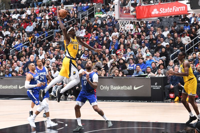 LOS ANGELES, CA - MARCH 25: Pascal Siakam #43 of the Indiana Pacers dunks the ball during the game against the LA Clippers on March 25, 2024 at Crypto.Com Arena in Los Angeles, California. NOTE TO USER: User expressly acknowledges and agrees that, by downloading and/or using this Photograph, user is consenting to the terms and conditions of the Getty Images License Agreement. Mandatory Copyright Notice: Copyright 2024 NBAE (Photo by Adam Pantozzi/NBAE via Getty Images)