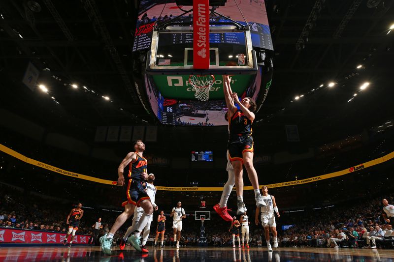 OKLAHOMA CITY, OK - APRIL 14:  Josh Giddey #3 of the Oklahoma City Thunder shoots the ball during the game against the Dallas Mavericks on April 14, 2024 at Paycom Arena in Oklahoma City, Oklahoma. NOTE TO USER: User expressly acknowledges and agrees that, by downloading and or using this photograph, User is consenting to the terms and conditions of the Getty Images License Agreement. Mandatory Copyright Notice: Copyright 2024 NBAE (Photo by Zach Beeker/NBAE via Getty Images)