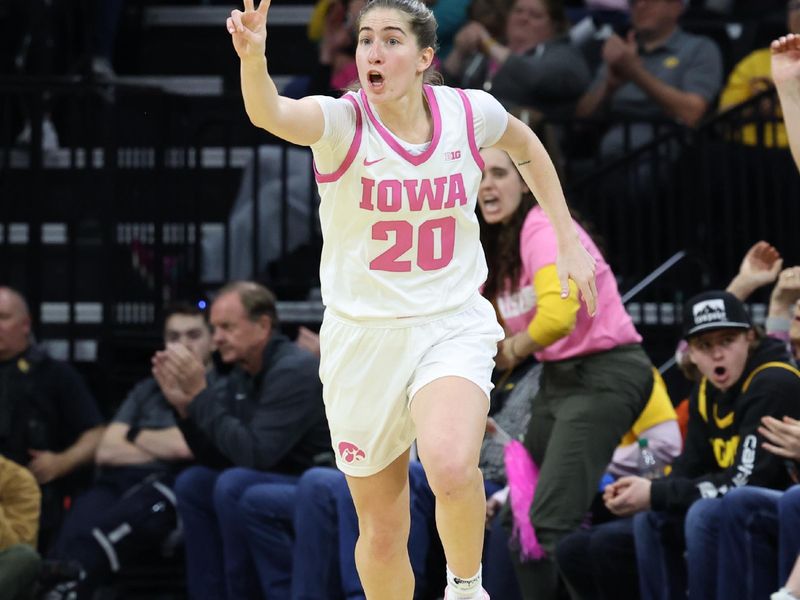 Feb 25, 2024; Iowa City, Iowa, USA; Iowa Hawkeyes guard Kate Martin (20) calls a play after scoring a basket against the Illinois Fighting Illini during the second half at Carver-Hawkeye Arena. Mandatory Credit: Reese Strickland-USA TODAY Sports