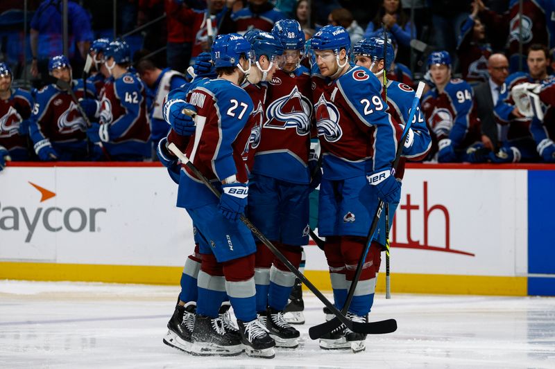 Mar 6, 2025; Denver, Colorado, USA; Colorado Avalanche center Martin Necas (88) celebrates his goal with left wing Jonathan Drouin (27) and defenseman Cale Makar (8) and center Nathan MacKinnon (29) and left wing Artturi Lehkonen (62) in the second period against the San Jose Sharks at Ball Arena. Mandatory Credit: Isaiah J. Downing-Imagn Images