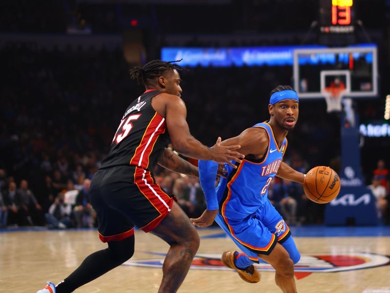 OKLAHOMA CITY, OK - FEBRUARY 12: Shai Gilgeous-Alexander #2 of the Oklahoma City Thunder dribbles the ball during the game against the Miami Heat on February 12, 2025 at Paycom Center in Oklahoma City, Oklahoma. NOTE TO USER: User expressly acknowledges and agrees that, by downloading and or using this photograph, User is consenting to the terms and conditions of the Getty Images License Agreement. Mandatory Copyright Notice: Copyright 2024 NBAE (Photo by Zach Beeker/NBAE via Getty Images)