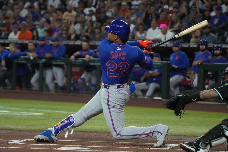 May 7, 2025; Phoenix, Arizona, USA; New York Mets outfielder Juan Soto (22) hits against the Arizona Diamondbacks in the first inning at Chase Field. Mandatory Credit: Rick Scuteri-Imagn Images