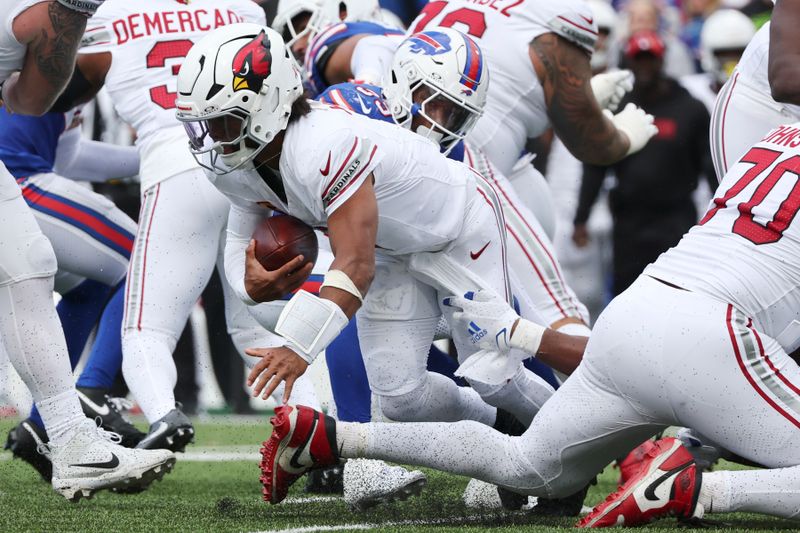 Arizona Cardinals quarterback Kyler Murray is sacked by Buffalo Bills defensive end Greg Rousseau during the second half of an NFL football game Sunday, Sept. 8, 2024, in Orchard Park, N.Y. (AP Photo/Jeffrey T. Barnes)