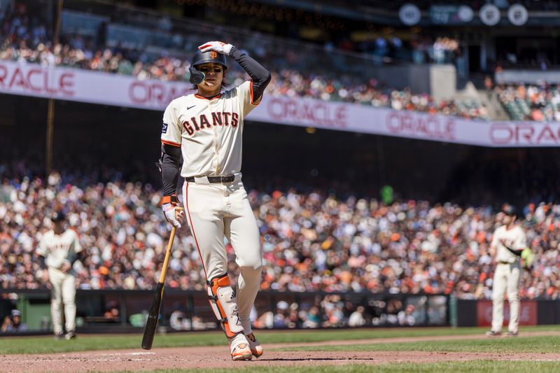 Apr 28, 2024; San Francisco, California, USA;  San Francisco Giants center fielder Jung Hoo Lee (51) reacts after taking a strike with runners in scoring position during the seventh inning of the game against the Pittsburgh Pirates at Oracle Park. Mandatory Credit: John Hefti-USA TODAY Sports