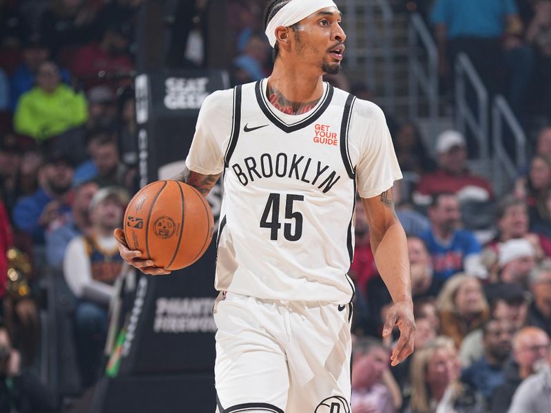 CLEVELAND, OH - MARCH 11: Keon Johnson #45 of the Brooklyn Nets dribbles the ball during the game against the Cleveland Cavaliers on March 11, 2025 at Rocket Arena in Cleveland, Ohio. NOTE TO USER: User expressly acknowledges and agrees that, by downloading and/or using this Photograph, user is consenting to the terms and conditions of the Getty Images License Agreement. Mandatory Copyright Notice: Copyright 2025 NBAE (Photo by Garrett Ellwood/NBAE via Getty Images)