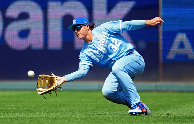 Jun 18, 2023; Kansas City, Missouri, USA; Kansas City Royals right fielder Nick Pratto (32) catches a line drive during the eighth inning against the Los Angeles Angels at Kauffman Stadium. Mandatory Credit: Jay Biggerstaff-USA TODAY Sports