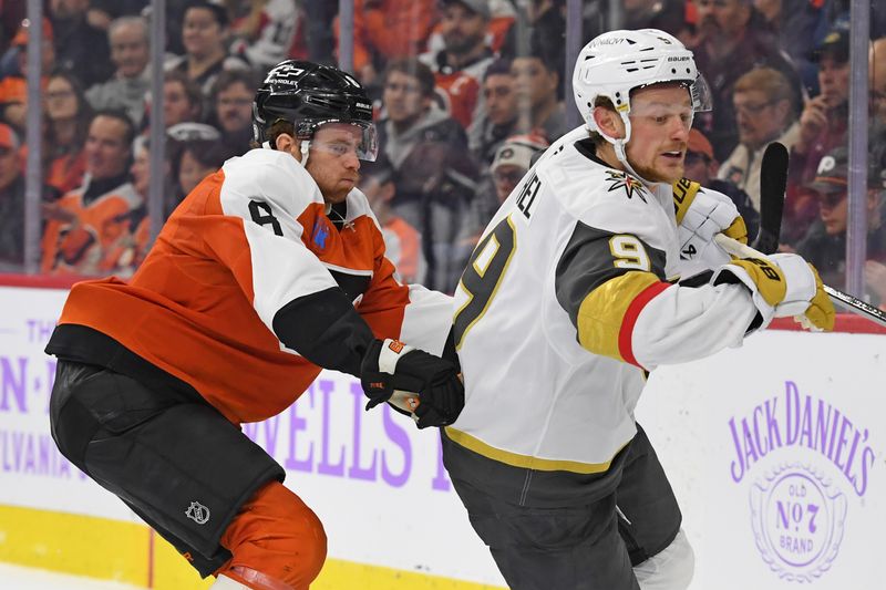 Nov 25, 2024; Philadelphia, Pennsylvania, USA; Vegas Golden Knights center Jack Eichel (9) and Philadelphia Flyers battle during the second period at Wells Fargo Center. Mandatory Credit: Eric Hartline-Imagn Images