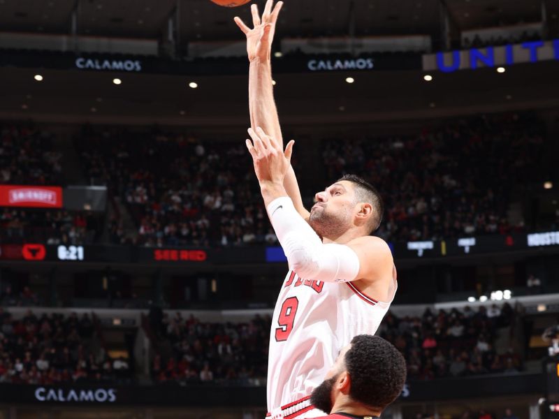 CHICAGO, IL - NOVEMBER 17:   Nikola Vucevic #9 of the Chicago Bulls shoots the ball during the game against the Houston Rockets during a regular season game on November 17, 2024 at United Center in Chicago, Illinois. NOTE TO USER: User expressly acknowledges and agrees that, by downloading and or using this photograph, User is consenting to the terms and conditions of the Getty Images License Agreement. Mandatory Copyright Notice: Copyright 2024 NBAE (Photo by Jeff Haynes/NBAE via Getty Images)