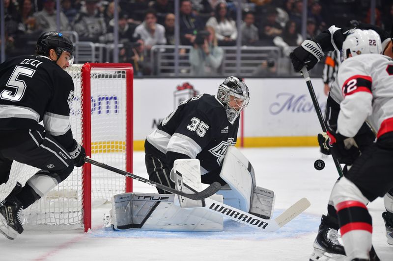 Nov 24, 2025; Los Angeles, California, USA; Los Angeles Kings goaltender Darcy Kuemper (35) defends the goal against the Ottawa Senators during the first period at Crypto.com Arena. Mandatory Credit: Gary A. Vasquez-Imagn Images