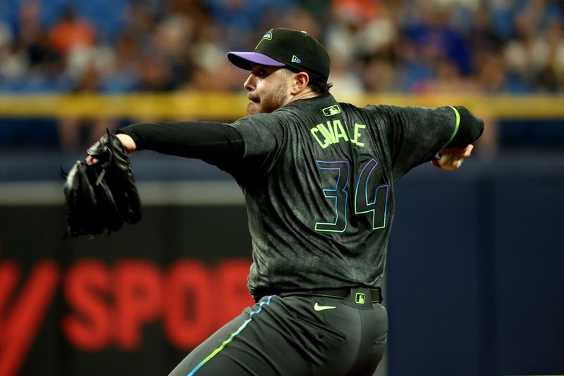 May 3, 2024; St. Petersburg, Florida, USA;Tampa Bay Rays pitcher Aaron Civale (34) throws a pitch against the New York Mets during the second inning at Tropicana Field. Mandatory Credit: Kim Klement Neitzel-USA TODAY Sports