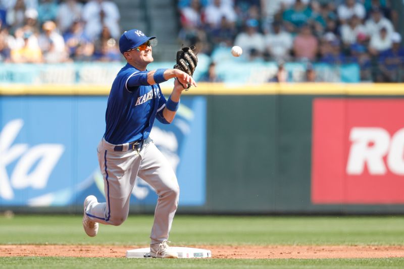 Aug 27, 2023; Seattle, Washington, USA; Kansas City Royals second baseman Michael Massey (19) makes a throwing error while attempting to turn a double play against the Seattle Mariners during the first inning at T-Mobile Park. Mandatory Credit: Joe Nicholson-USA TODAY Sports