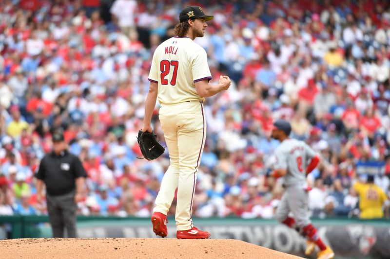 May 19, 2024; Philadelphia, Pennsylvania, USA; Philadelphia Phillies pitcher Aaron Nola (27) reacts after allowing a two run home run against Washington Nationals outfielder Eddie Rosario (8) during the fourth inning at Citizens Bank Park. Mandatory Credit: Eric Hartline-USA TODAY Sports