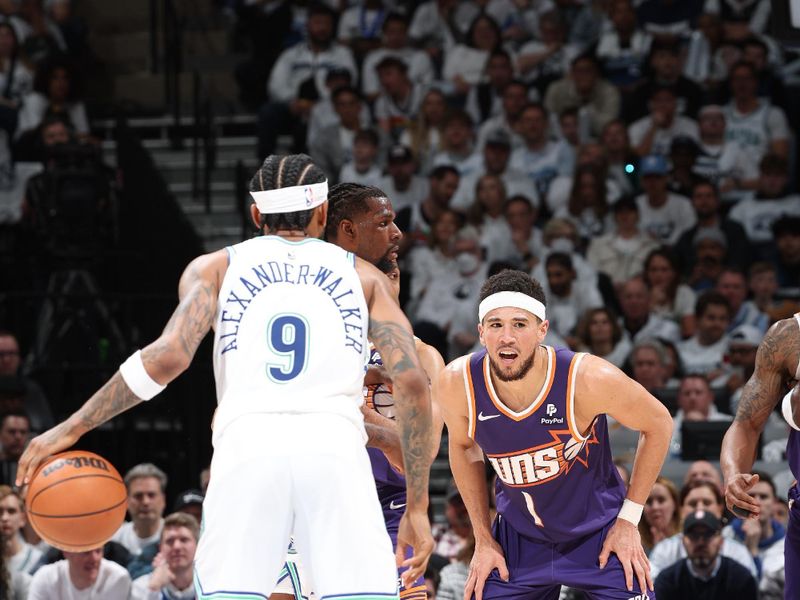 MINNEAPOLIS, MN -  APRIL 23: Devin Booker #1 of the Phoenix Suns plays defense during the game against the Minnesota Timberwolves during Round 1 Game 2 of the 2024 NBA Playoffs on April 23, 2024 at Target Center in Minneapolis, Minnesota. NOTE TO USER: User expressly acknowledges and agrees that, by downloading and or using this Photograph, user is consenting to the terms and conditions of the Getty Images License Agreement. Mandatory Copyright Notice: Copyright 2024 NBAE (Photo by David Sherman/NBAE via Getty Images)