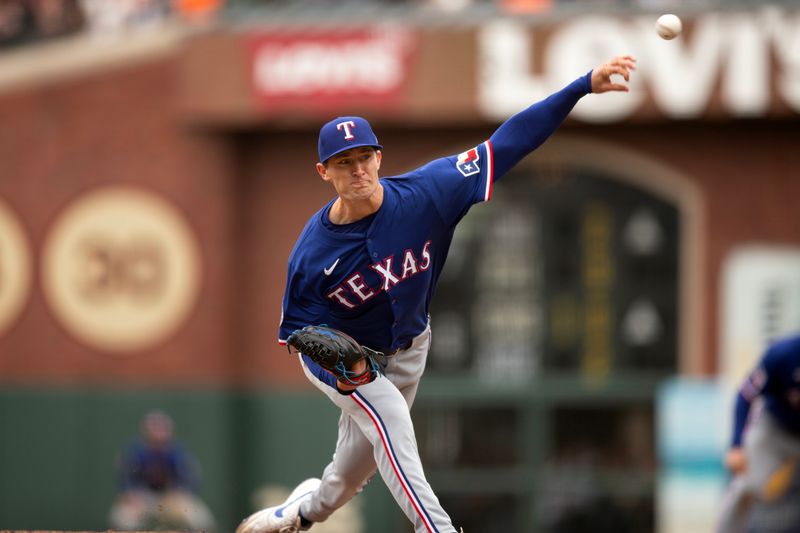 Apr 26, 2025; San Francisco, California, USA; Texas Rangers pitcher Jacob Latz (67) delivers a pitch against the San Francisco Giants during the ninth inning at Oracle Park. Mandatory Credit: D. Ross Cameron-Imagn Images