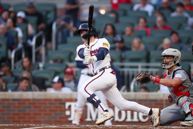 May 5, 2025; Atlanta, Georgia, USA; Atlanta Braves shortstop Nick Allen (2) hits a single against the Cincinnati Reds in the third inning at Truist Park. Mandatory Credit: Brett Davis-Imagn Images