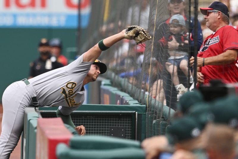 Jun 22, 2023; Cleveland, Ohio, USA; Oakland Athletics first baseman Ryan Noda (49) catches a foul ball hit by Cleveland Guardians shortstop Amed Rosario (not pictured) during the first inning at Progressive Field. Mandatory Credit: Ken Blaze-USA TODAY Sports