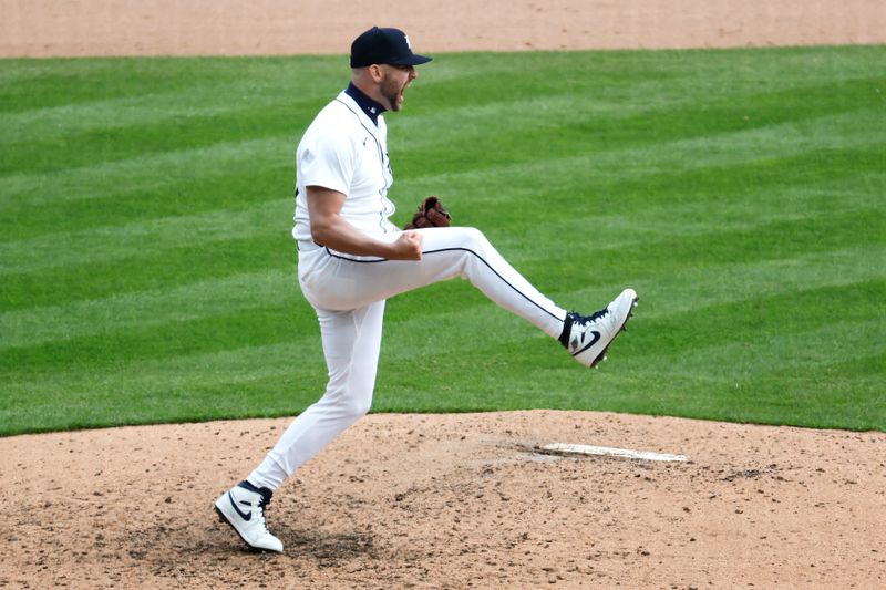 Apr 5, 2024; Detroit, Michigan, USA;  Detroit Tigers relief pitcher Alex Lange (55) celebrates after defeating the Oakland Athletics at Comerica Park. Mandatory Credit: Rick Osentoski-USA TODAY Sports