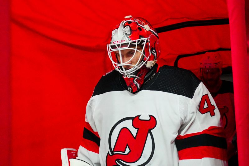 May 11, 2023; Raleigh, North Carolina, USA; New Jersey Devils goaltender Akira Schmid (40) comes out onto the ice for the warmups before game five of the second round of the 2023 Stanley Cup Playoffs against the Carolina Hurricanes at PNC Arena. Mandatory Credit: James Guillory-USA TODAY Sports