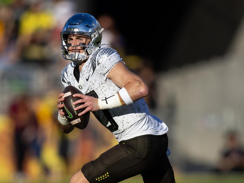 Nov 18, 2023; Tempe, Arizona, USA; Oregon Ducks quarterback Bo Nix (10) against the Arizona State Sun Devils at Mountain America Stadium. Mandatory Credit: Mark J. Rebilas-USA TODAY Sports