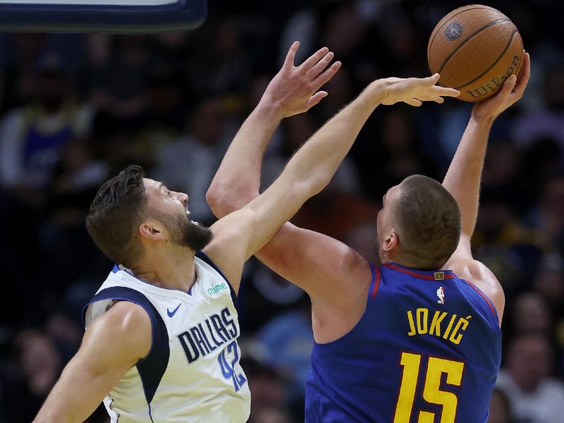 DENVER, COLORADO - NOVEMBER 22: Nikola Jokic #15 of the Denver Nuggets puts up a shot against Maxi Kleber #42 of the Dallas Mavericks in the first quarter of the Emirates NBA Cup at Ball Arena on November 22, 2024 in Denver, Colorado. NOTE TO USER: User expressly acknowledges and agrees that, by downloading and or using this photograph, User is consenting to the terms and conditions of the Getty Images License Agreement.  (Photo by Matthew Stockman/Getty Images)