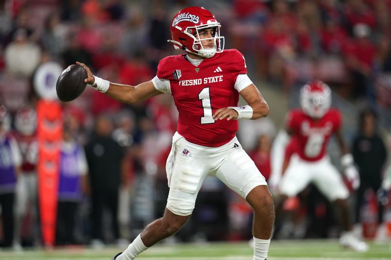 Sep 30, 2023; Fresno, California, USA; Fresno State Bulldogs quarterback Mikey Keene (1) throws a pass against the Nevada Wolf Pack in the third quarter at Valley Children's Stadium. Mandatory Credit: Cary Edmondson-USA TODAY Sports