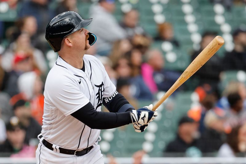 Apr 30, 2023; Detroit, Michigan, USA; Detroit Tigers catcher Jake Rogers (34) hits a two run home run in the fifth inning against the Baltimore Orioles at Comerica Park. Mandatory Credit: Rick Osentoski-USA TODAY Sports